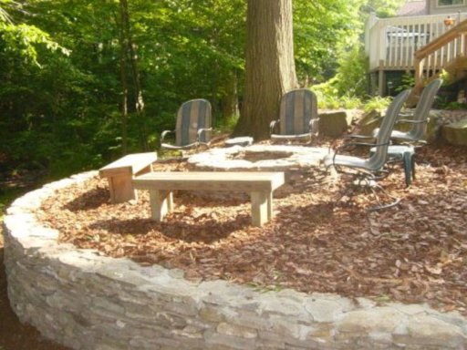 Firepit on natural hill w retaining wall