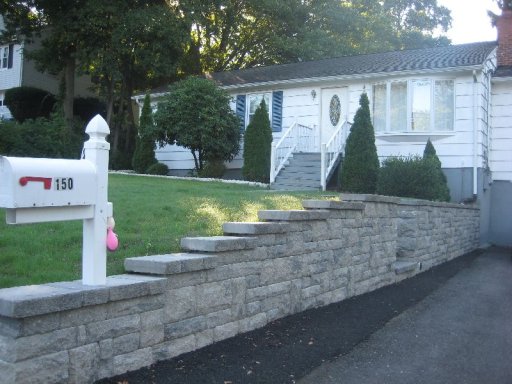 Retaining wall with Stair System to walkway and embedded mailbox
